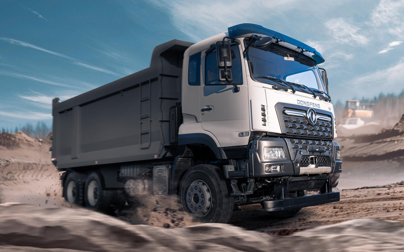 Dongfeng KC PRO tipper driving through dust on a site